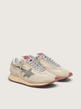 Marathon för herr med beige nylonöverdel och grå stjärna
