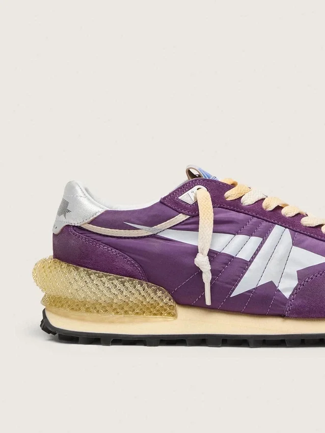 Marathon för herr med lila nylonöverdel och vit stjärna