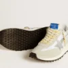 Marathon för herr med vit ovandel i nylon och silverfärgad stjärna
