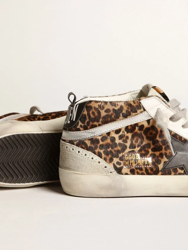 Mid Star för dam i ponnyskinn med leopardmönster och svart stjärna