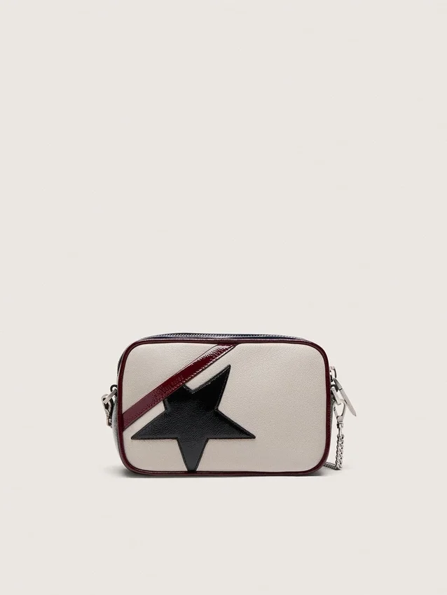 Mini Star Bag i smörvitt läder med svart stjärna och vinröda samt mörkblå detaljer