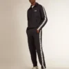 Mörkblå sweatshirt med vit rand och kontrasterande blå stjärnor