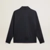 Mörkblå sweatshirt med vit rand och kontrasterande blå stjärnor