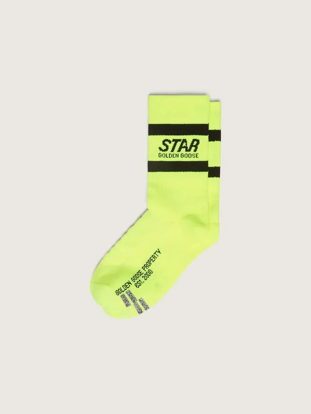 Neongula sportstrumpor med svarta ränder