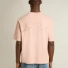 Puderrosa T-shirt med omvänt logo på ryggen – Jersey Capsule