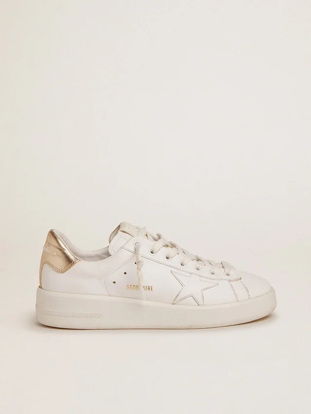 Purestar-sneakers för damer med guldfärgad hälflik