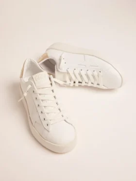 Purestar-sneakers för damer med guldfärgad hälflik