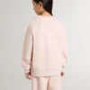 Rosa sweatshirt för flickor med rosa text på framsidan