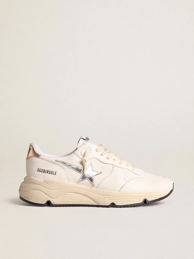 Running Sole i nappa med silverfärgad stjärna och guldfärgad läderflik på hälen