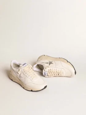Running Sole i nappa med silverfärgad stjärna och guldfärgad läderflik på hälen