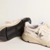 Running Sole i nappa med silverfärgad stjärna och guldfärgad läderflik på hälen