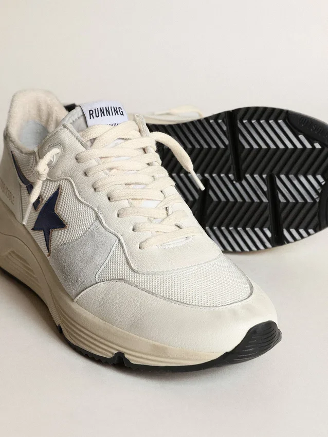 Running Sole i vitt läder och mesh med blå stjärna i laminerat läder