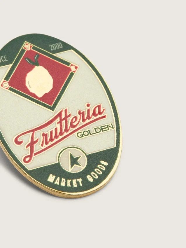 Set med två ”Frutteria Golden”-pins