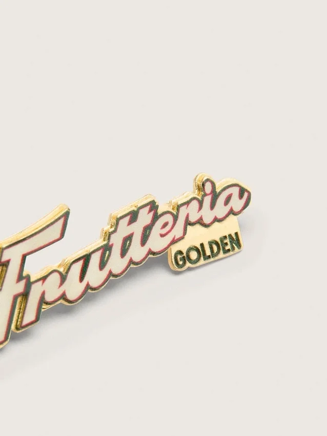 Set med två ”Frutteria Golden”-pins