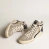Slide i beige mesh och nylon med blå läderstjärna och blixtsymbol
