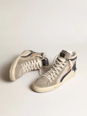 Slide i beige mesh och nylon med blå läderstjärna och blixtsymbol