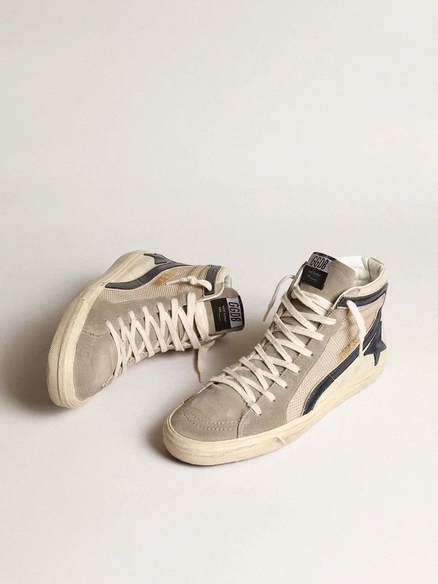 Slide i beige mesh och nylon med blå läderstjärna och blixtsymbol