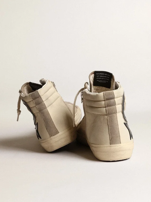 Slide i beige mesh och nylon med blå läderstjärna och blixtsymbol