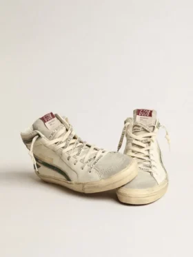 Slide i beige nappa med grön stjärna och blixt i laminerat läder