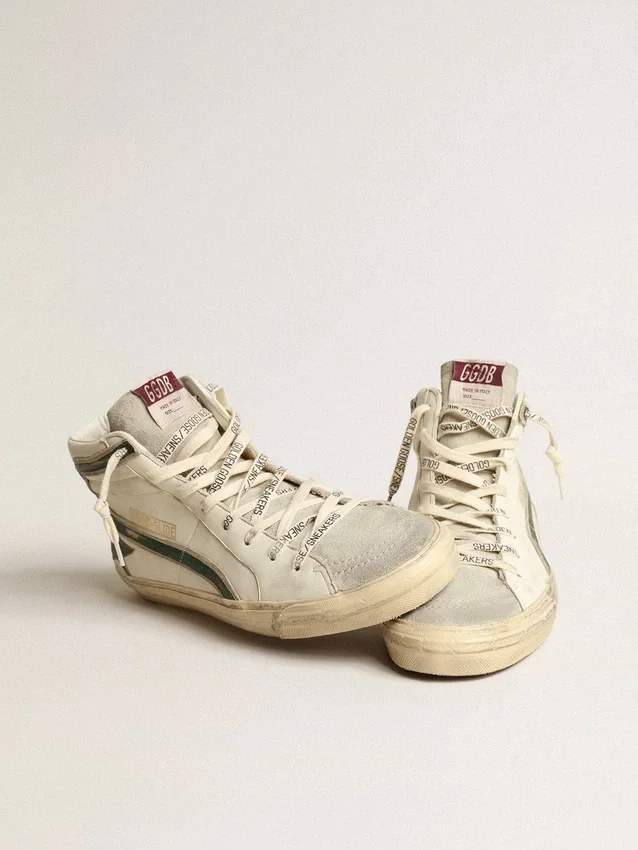 Slide i beige nappa med grön stjärna och blixt i laminerat läder