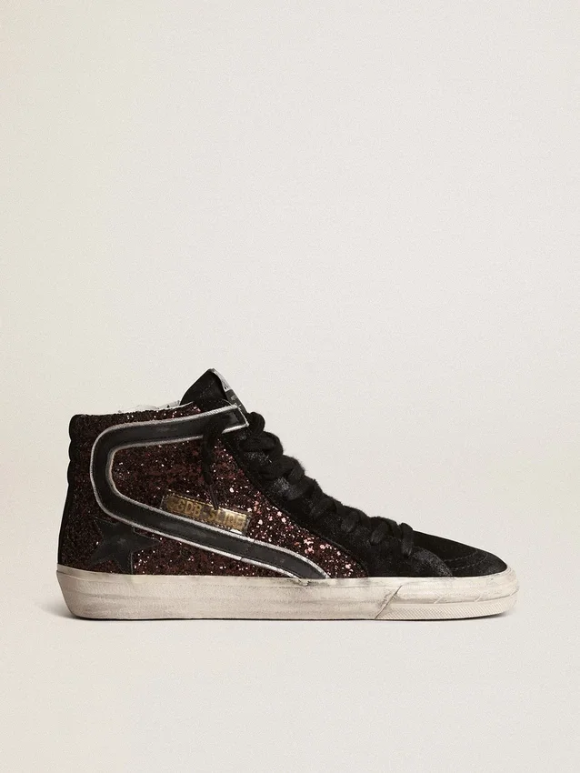 Slide i brunt glitter med svart läderstjärna och glitter