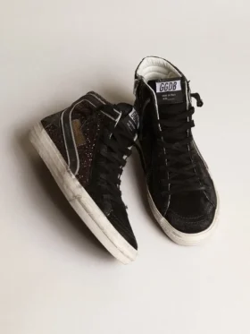 Slide i brunt glitter med svart läderstjärna och glitter