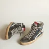 Slide-sneakers i midnattsblå denim med vit läderstjärna