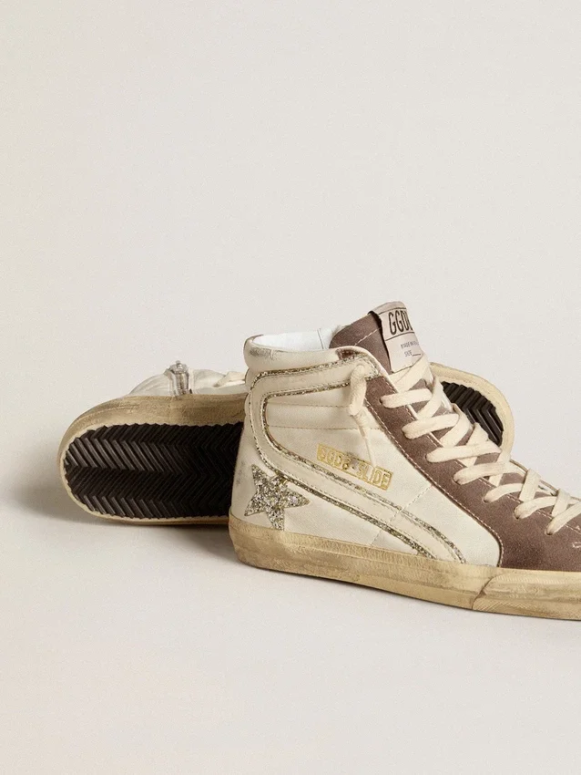 Slide-sneakers i nappa med glitterstjärna och detaljer i lackläder