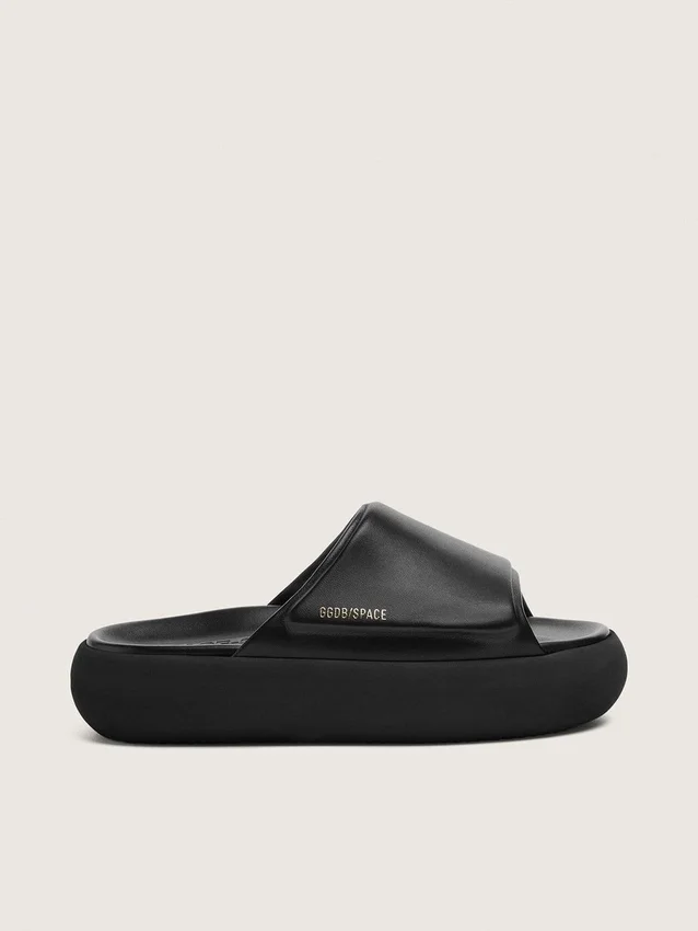 Space-Star-slip-ons för damer i svart läder