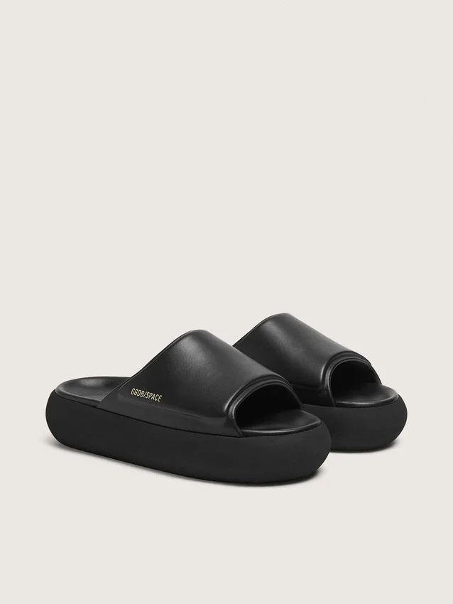 Space-Star-slip-ons för damer i svart läder