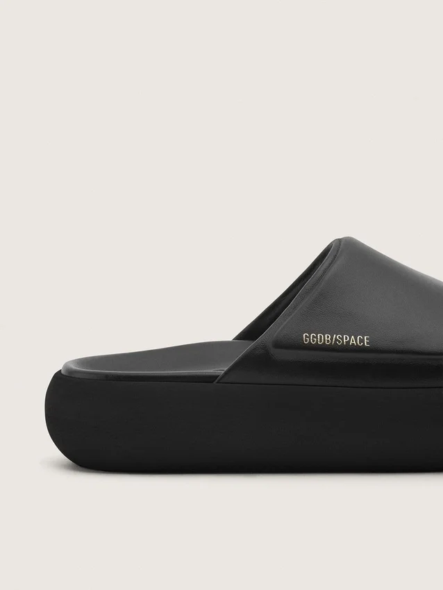 Space-Star-slip-ons för damer i svart läder