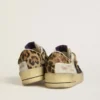 Stardan för dam i nappa och mesh med hälflik i ponnyskinn med leopardmönster