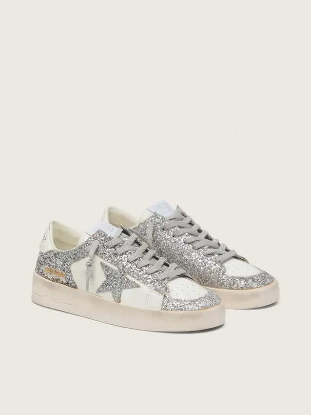 Stardan för damer i vitt läder och glitter