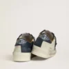 Stardan för herr i nubuck med stjärna i metalliskt läder och blå nappa-hälflik