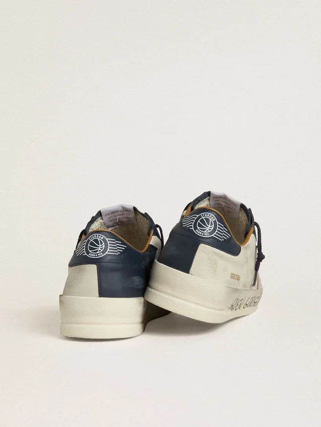 Stardan för herr i nubuck med stjärna i metalliskt läder och blå nappa-hälflik
