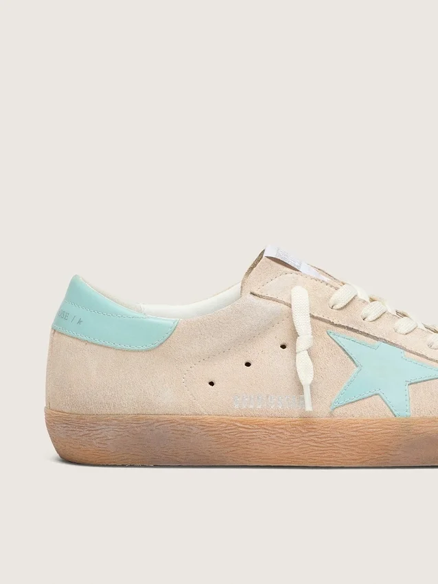 Super-Star för herr i beige mocka med aquagrön stjärna