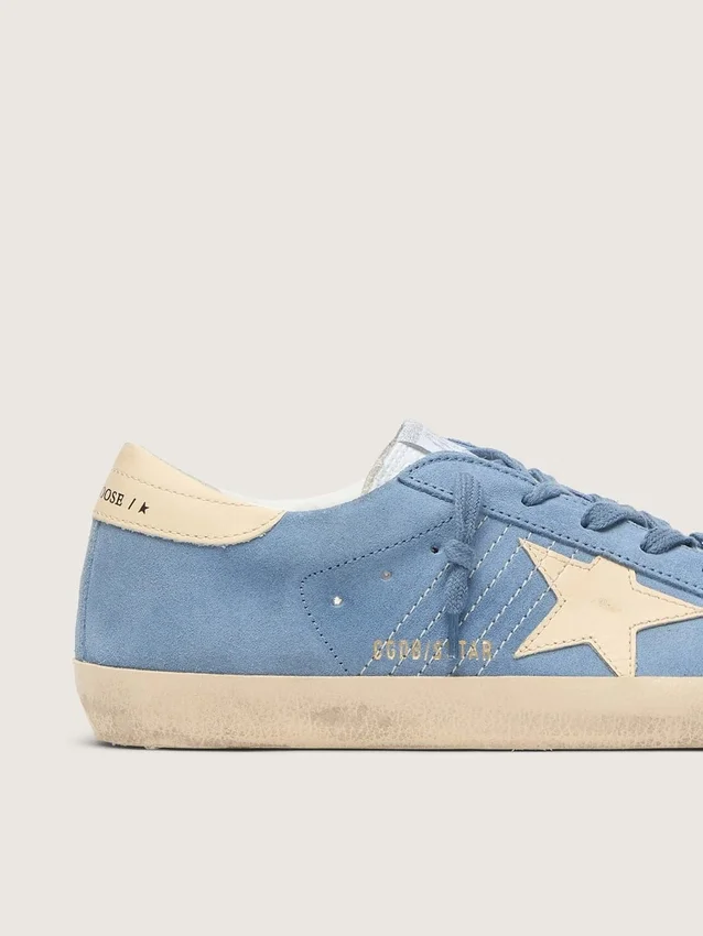 Super-Star i ljusblå mocka med beige läderstjärna och hälflik