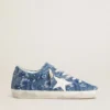 Super-Star LTD för damer i ljusblå denim med en vit läderstjärna och broderade blommor