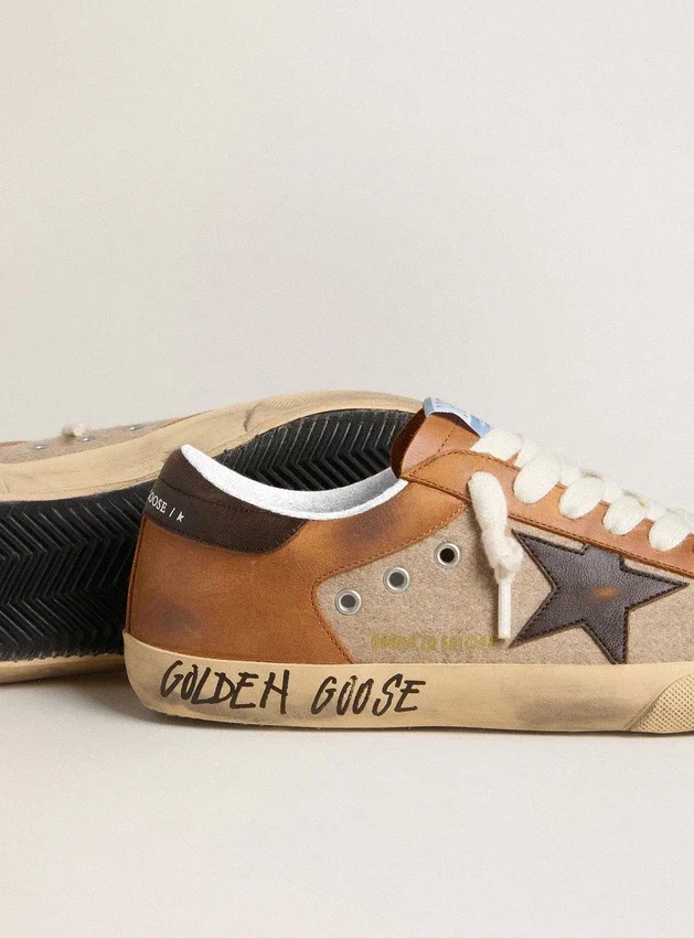 Super-Star LTD för herr i beige ull med brun läderstjärna och kamelfärgade insatser