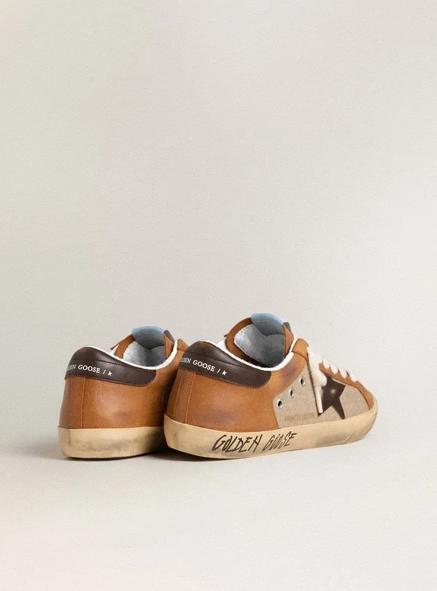 Super-Star LTD för herr i beige ull med brun läderstjärna och kamelfärgade insatser