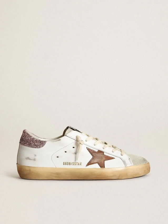 Super-Star med en beige stjärna och rosa glitter på hälfliken