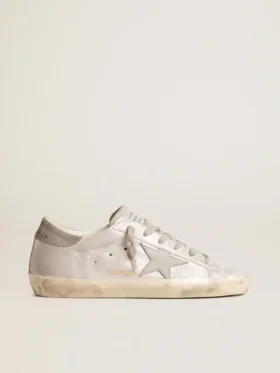 Super-Star-sneakers i gråvitt läder med glittereffekt och läderstjärna