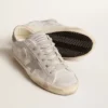Super-Star-sneakers i gråvitt läder med glittereffekt och läderstjärna