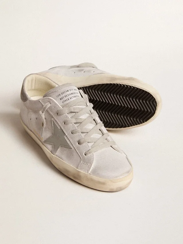 Super-Star-sneakers i gråvitt läder med glittereffekt och läderstjärna