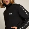Svart herrsweatshirt med dragkedja och vita stjärnor