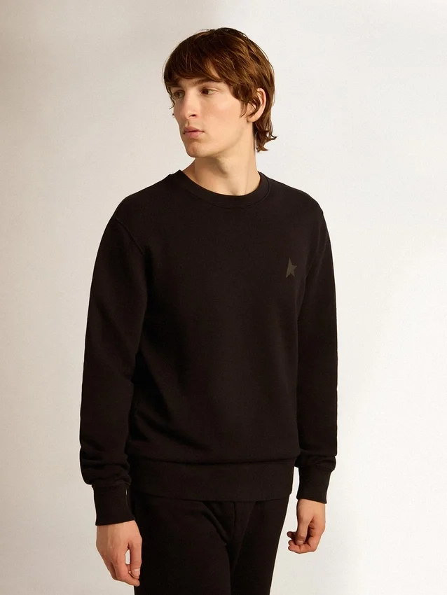 Svart sweatshirt från Archibald Star Collection med ton-i-ton-stjärna på framsidan