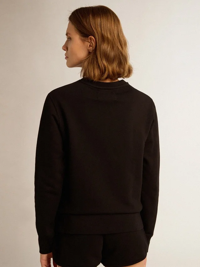 Svart sweatshirt från Athena Star Collection med ton-i-ton-stjärna på framsidan