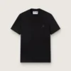 Svart T-shirt från Star Collection med ton-i-ton-stjärna på framsidan