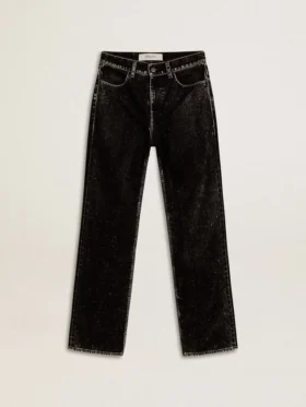 Svarta damjeans med en sammetliknande tvättad effekt
