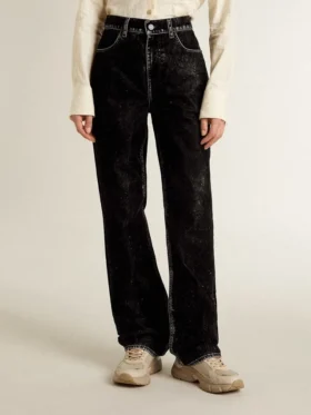 Svarta damjeans med en sammetliknande tvättad effekt